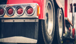 Closeup of the Rear Tires and Lights of a Custom Hopper Bottom Trailer